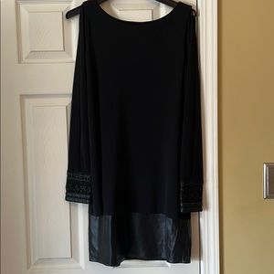 beautiful leather detailing and open slit sleeves